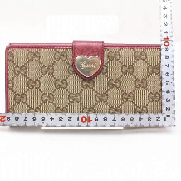 Gucci Handbags - 100% Auth Gucci Brown/Pink Long Canvas Wallet